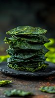 Stack of crispy dried seaweed sheets on slate board, healthy Asian snack food for organic nutrition and wellness lifestyle concepts.