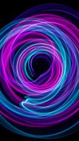 Neon spiral vortex with glowing magenta and cyan swirls creating a dynamic tunnel effect on black background, suitable for tech and digital design projects.