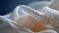 Abstract flowing white fabric with golden polka dots creating elegant waves and curves against dark background for luxury textile design projects.