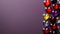 Colorful heart-shaped glass beads arranged on purple gradient background with copy space, romantic jewelry elements for Valentine's day designs and decorations.