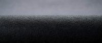 Dense black foam texture with gradient lighting creating depth and shadow effects for industrial design applications.