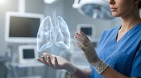 Female healthcare professional in blue scrubs displaying holographic lung anatomy in modern medical facility for respiratory health education and diagnosis.