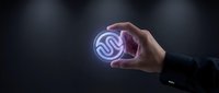 Hand holding glowing neon circular symbol with swirling lines against dark background, representing innovation, technology, and digital transformation for business concepts.