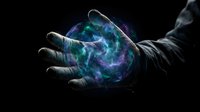 Mystical energy orb floating above open palm with swirling blue and purple cosmic light effects against dark background for fantasy and magic concepts.