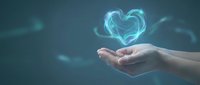 Hands cupping glowing blue heart symbol representing love, care, healthcare, charity, and emotional wellness concepts for digital design.