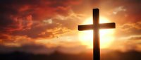 Christian cross silhouette against dramatic sunset sky with golden light rays. Religious symbol for Easter, faith, hope, spirituality and worship backgrounds.