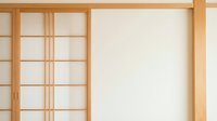 Traditional Japanese sliding doors with wooden grid frames and translucent paper panels creating minimalist interior design for modern home decoration.