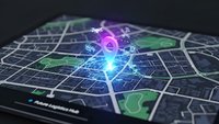 Digital city map with glowing GPS navigation points and location markers for smart urban planning and transportation technology applications.