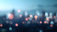 Glowing pink and blue bokeh lights floating in dark atmospheric background with sparkles and blurred circles create dreamy magical mood for design projects.