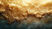 Dramatic aerial view of golden ocean waves crashing against dark rocky coastline during sunset, creating dynamic contrast between warm and cool tones in nature.