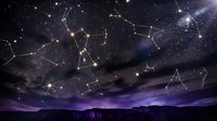 Night sky with constellation patterns connected by golden lines over mountain silhouette, starry cosmic background with nebula clouds for astronomy education.