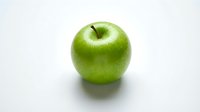 Fresh green apple isolated on white background, ready for design use in food, nutrition, and healthy lifestyle projects.