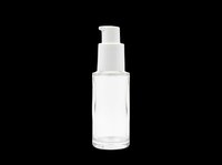 Clear glass bottle with white pump dispenser, isolated on transparent background. Ready for cosmetics, skincare, and beauty product packaging designs. Perfect for e-commerce, print-on-demand, and digital marketing materials.