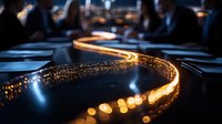 Glowing curved light trail with golden bokeh effect on dark background creates atmospheric mood for creative night photography and festive designs.