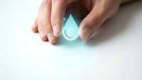 Close-up of hands holding glowing water droplet symbol, representing clean water, environmental conservation, sustainability, and eco-friendly concepts for business and wellness.