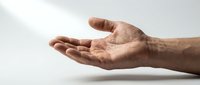 Open male hand gesture reaching out in protective caring motion against clean white background for design concepts and presentations.