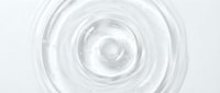 Clear liquid swirl in circular motion, isolated on white background, suitable for cosmetics, skincare, and product packaging design.