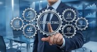 Professional businessman in suit presenting consulting services concept with interconnected gear icons representing business strategy and advisory solutions.
