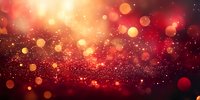 Red and gold glowing bokeh lights on dark background with sparkle effect and defocused particles creating magical festive atmosphere.