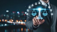Professional businessman touching digital justice scales with network of people icons representing legal technology and human resources management solutions.