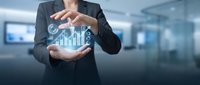 Professional businessman protecting holographic financial growth chart with hands in modern office environment for business analytics presentations.