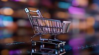 Empty shopping cart on dark background with colorful bokeh lights, retail and commerce concept for online stores and e-commerce business.