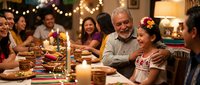 Multi-generational Hispanic family enjoying festive dinner celebration with warm lighting, traditional decorations and joyful atmosphere together.