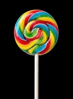 Rainbow swirl lollipop isolated on transparent background, ready for stickers, t-shirt design, print on demand, clipart, and sublimation projects.