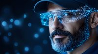 Middle-aged bearded man wearing futuristic smart glasses with glowing digital particles and blue technology visualization effects against dark background.