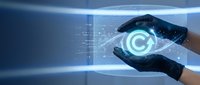 Digital copyright protection concept with glowing copyright symbol held between hands, representing intellectual property rights and legal protection in technology and business environments.