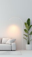 Modern minimalist living room with white curved floor lamp, light gray sofa, and potted tropical plant against neutral wall. Warm lighting creates cozy atmosphere.