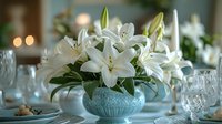 Elegant white lily centerpiece arrangement in vintage blue vase on formal dining table with crystal glasses and place settings, soft bokeh background creates romantic mood.