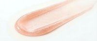 Shimmering nude lip gloss with sparkle finish on white background, suitable for cosmetics advertising and beauty product marketing.