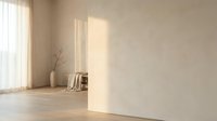 Minimalist interior room with natural sunlight streaming through window creating warm shadows on beige wall and wooden floor for home design projects.