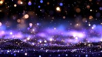 Magical glowing bokeh lights on dark background with purple and blue sparkles creating dreamy atmospheric effect. Defocused particles float in space.