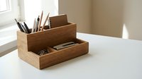 Wooden desk organizer with multiple compartments for pens, pencils and office supplies on white surface in bright natural light for workspace organization.