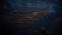 Dark wooden texture with deep blue tones and natural grain patterns, dramatic lighting highlights organic swirls and knots in aged timber surface.