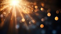 Glowing rays of golden light burst through darkness with floating bokeh circles creating magical atmospheric effect. Suitable for spiritual and festive designs.