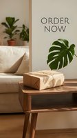 Kraft paper wrapped gift box tied with twine on wooden table, monstera leaf, cozy living room, order now text, eco shopping concept.