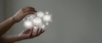 Hand holding glowing digital cubes representing data, technology, and innovation for business, computing, and future digital transformation concepts.