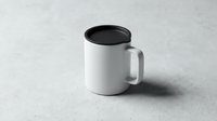 White ceramic coffee mug with black interior on textured surface, mockup template for custom designs and branding applications.