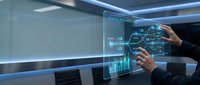 Professional businessman interacting with futuristic holographic interface displaying data analytics and digital technology in modern office environment.