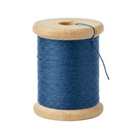 Spool of blue thread with wooden top and bottom caps, isolated on white background for crafting, sewing, and textile design projects.