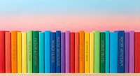 Colorful books arranged in rainbow order on shelf against pastel gradient background for education, reading and library concepts.