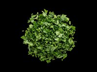 Freshly chopped green herbs pile isolated on transparent background, ready for food design, stickers, print on demand, T-shirts, and culinary clipart use.