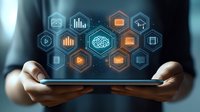 Businessman holding tablet with glowing hexagonal technology icons displaying data analytics, cloud computing and digital innovation concepts for modern business.