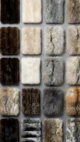 Collection of luxury fur samples in various colors and textures arranged in grid pattern for fashion design and textile industry applications.