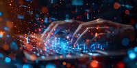 Hands typing on illuminated keyboard with futuristic digital transformation effect, glowing particles and bokeh lights perfect for technology and innovation concepts.
