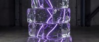 Glowing purple electric energy crackling through transparent glass cubes stacked in dark industrial setting with dramatic lighting effects.