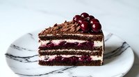 Decadent chocolate layer cake slice with cherries and cream filling on marble plate, gourmet dessert for bakery menu and culinary photography.